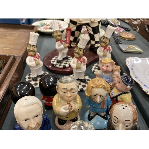 228 - A COLLECTION OF CERAMIC SALT AND PEPPER POTS IN THE GUISE OF FAMOUS FIGURES TO INCLUDE MARGARET THAT... 