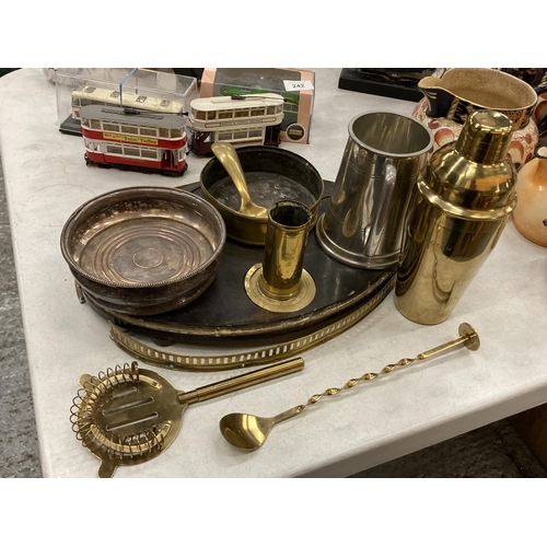 241 - A QUANTITY OF BRASSWARE TO INCLUDE TRENCH ART, PLUS A GOLD COLOURED DARTINGTON COCKTAIL SHAKER, FLAT... 