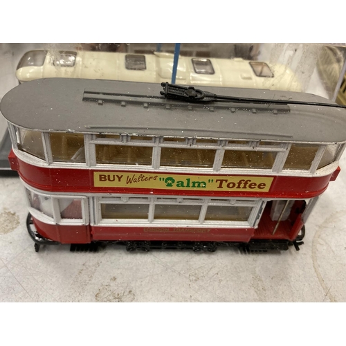 242 - FOUR 1/76 SCALE DIECAST MODELS TO INCLUDE TWO BOXED OXFORD DIECAST BUSES AND TWO UNBOXED CORGI TRAMS