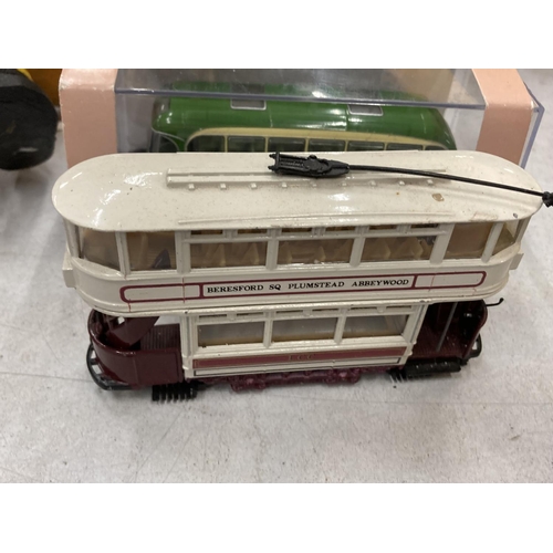 242 - FOUR 1/76 SCALE DIECAST MODELS TO INCLUDE TWO BOXED OXFORD DIECAST BUSES AND TWO UNBOXED CORGI TRAMS