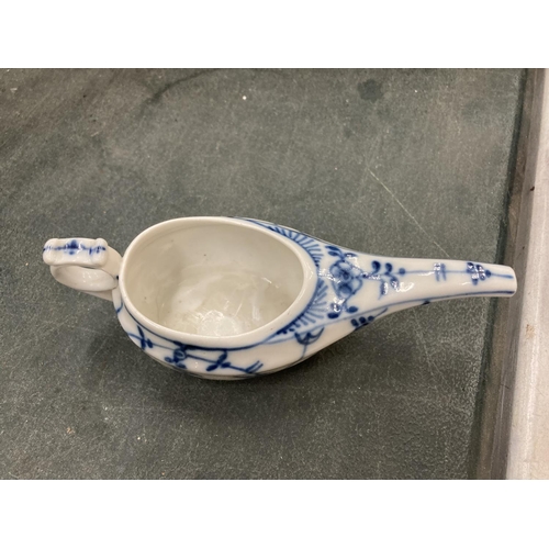 244 - AN ORIENTAL BLUE AND WHITE DRINKING VESSEL