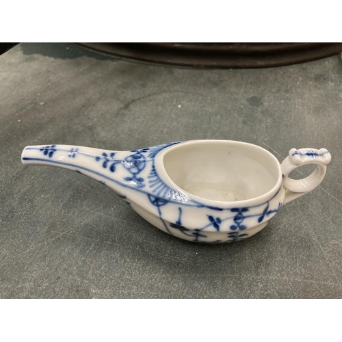 244 - AN ORIENTAL BLUE AND WHITE DRINKING VESSEL