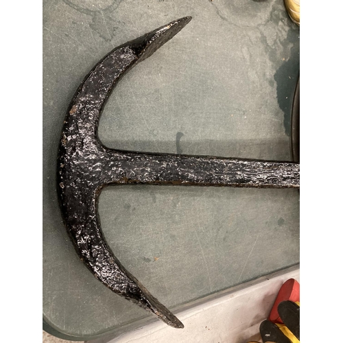 245 - A VINTAGE CAST ANCHOR LENGTH 62CM AND AN EMBOSSED METALWARE CENTRE CEILING LIGHT HOLDER