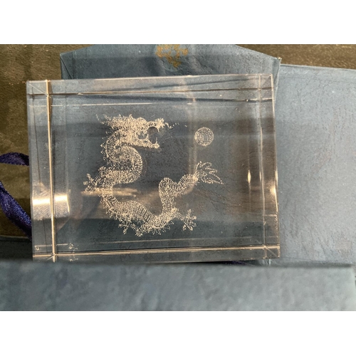 248 - TEN BOXED DRAGON LASERCUT PAPERWEIGHTS