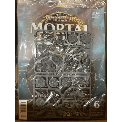 267 - TEN MORTAL REALMS MODEL KITS AND A FOLDER WITH GLUE AND SNIPS