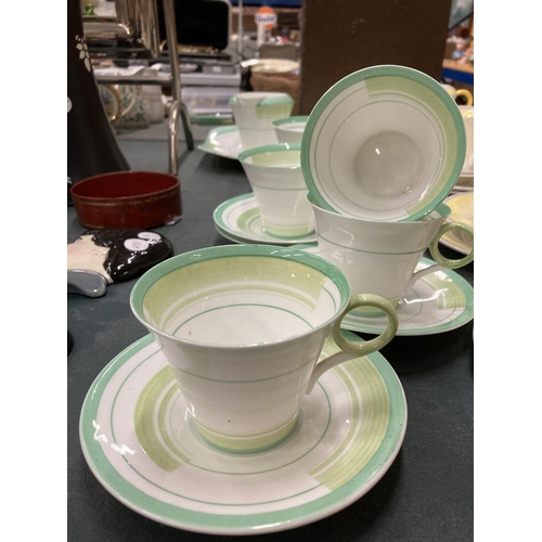 61 - TWO ART DECO SHELLEY PART TEASETS - YELLOW AND GREEN - TO INCLUDE CAKE PLATES, CUPS, SAUCERS, SIDE P... 