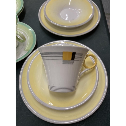 61 - TWO ART DECO SHELLEY PART TEASETS - YELLOW AND GREEN - TO INCLUDE CAKE PLATES, CUPS, SAUCERS, SIDE P... 