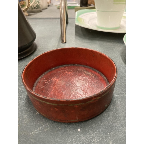 63 - A BELIEVED ENGLISH REGENCY CIRCA 19TH CENTURY WINE COASTER IN CINNABAR RED LACQUER