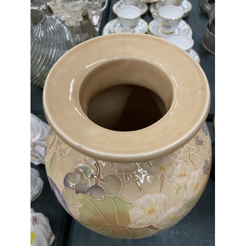 78 - A LARGE PEACH COLOURED VASE WITH FLORAL DECORATION HEIGHT 30CM