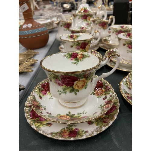 85 - A ROYAL ALBERT 'OLD COUNTRY ROSES' TEASET TO INCLUDE A TEAPOT, CREAM JUGS, SUGAR BOWL, CUPS, SAUCERS... 