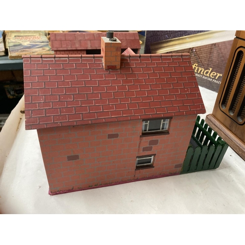 269 - A MODEL OF A FARMHOUSE AND STABLE BLOCK WITH A LANDROVER AND HORSEBOX AND A CAR AND CARAVAN