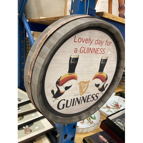 290 - A WOODEN BARREL TOP GUINNESS SIGN DIAMETER 37.5CM