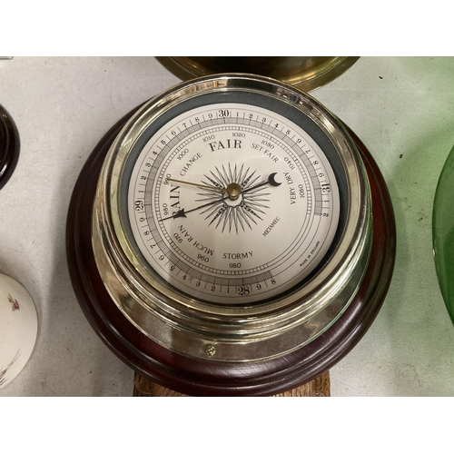 761 - THREE BAROMETERS TO INCLUDE A BRASS CASED ROUND ANEROID, A WOOD AND BRASS METAMEC AND AN OAK CASED W... 