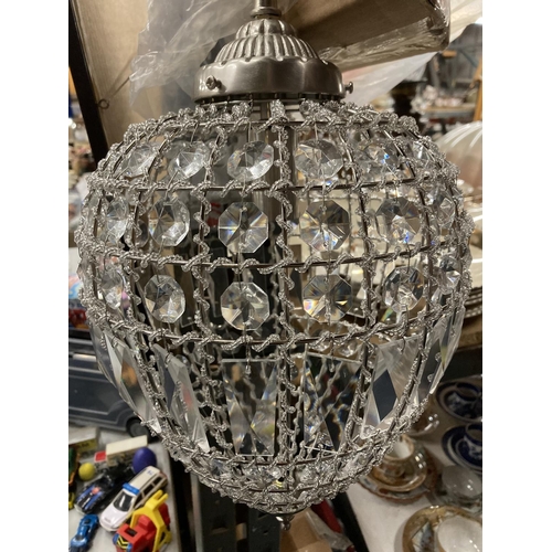 784 - A TEARDROP LIGHT SHADE WITH CRYSTALS AND A CHAIN FITTING