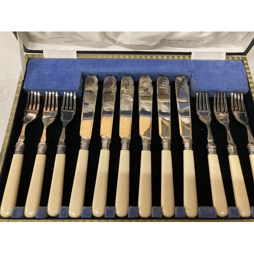 788 - A VINTAGE CASED SET OF KNIVES, FORKS AND SERVING UTENSILS