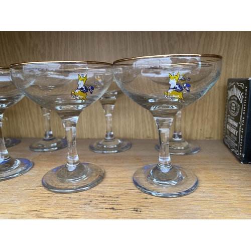 1381 - NINE RETRO BABYCHAM GLASSES AND FOUR JACK DANIELS WHISKEY TUMBLERS