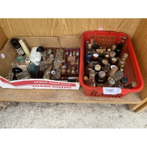 1387 - A LARGE ASSORTMENT OF VINTAGE GLASS BOTTLES AND VARIOUS STOPPERS