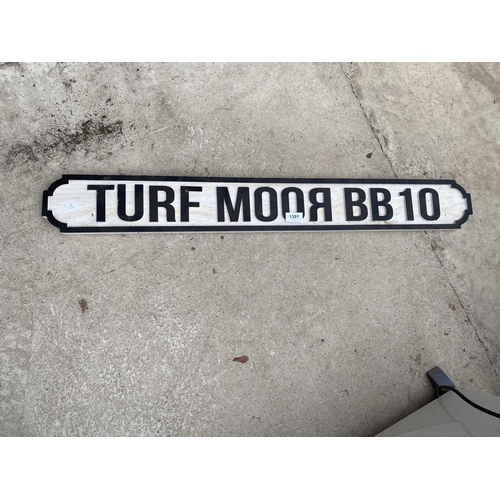 1391 - A VINTAGE STYLE WOODEN 'TURF MOOR BB10' SIGN