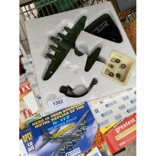 1392 - AN ASSORTMENT OF TOYS TO INCLUDE AN ATLAS EDITIONS B-17F AREOPLANE, CARS AND MAGAZINES ETC