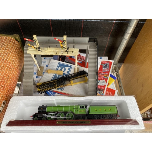 1393 - AN ASSORTMENT OF MODEL TRAIN ITEMS TO INCLUDE A HORNBY 00 GAUGE 'UNITED DAIRIES' SCALE MODEL AND RAI... 