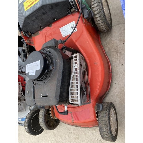 1441 - A PETROL ENGINE LAWN MOWER WITH GRASS BOX BELIEVED IN WORKING ORDER BUT NO WARRANTY