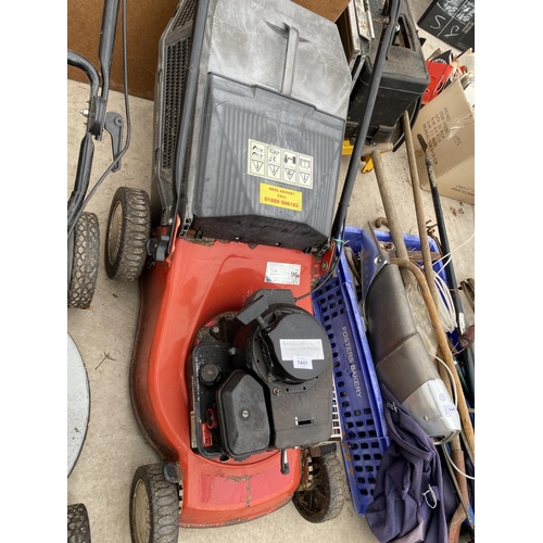 1441 - A PETROL ENGINE LAWN MOWER WITH GRASS BOX BELIEVED IN WORKING ORDER BUT NO WARRANTY