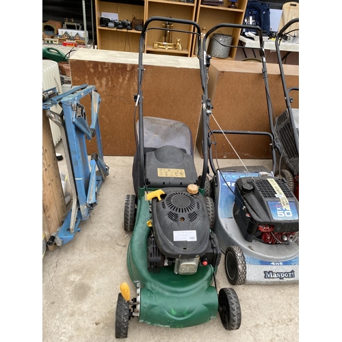 1443 - A PETROL ENGINE LAWN MOWER WITH GRASS BOX BELIEVED IN WORKING ORDER BUT NO WARRANTY