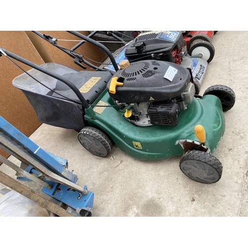 1443 - A PETROL ENGINE LAWN MOWER WITH GRASS BOX BELIEVED IN WORKING ORDER BUT NO WARRANTY