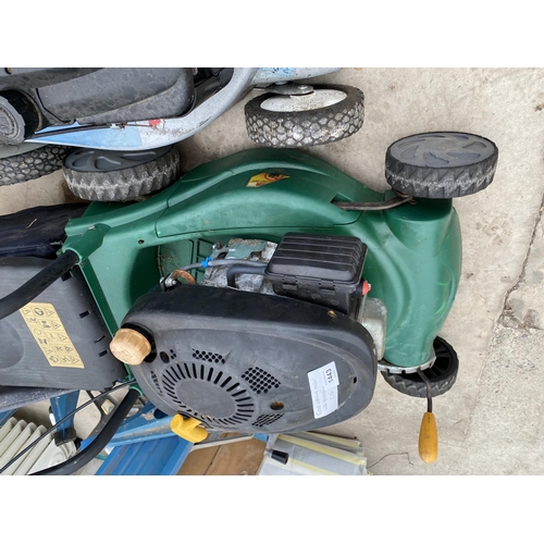 1443 - A PETROL ENGINE LAWN MOWER WITH GRASS BOX BELIEVED IN WORKING ORDER BUT NO WARRANTY