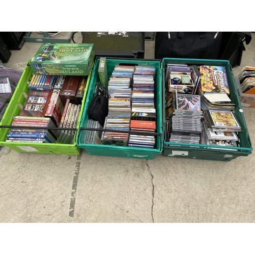 A LARGE ASSORTMENT OF CDS AND DVDS