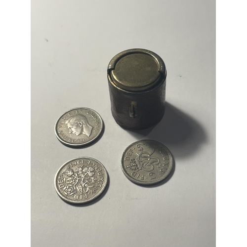 673 - A SIXPENCE COIN HOLDER AND THREE SIXPENCES TO INCLUDE 1947, 1949 AND 1961