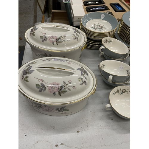 711 - A LARGE QUANTITY OF ROYAL DOULTON 'ROSE ELEGANS' DINNERWARE TO INCLUDE VARIOUS SIZED PLATES, COFFEE ... 