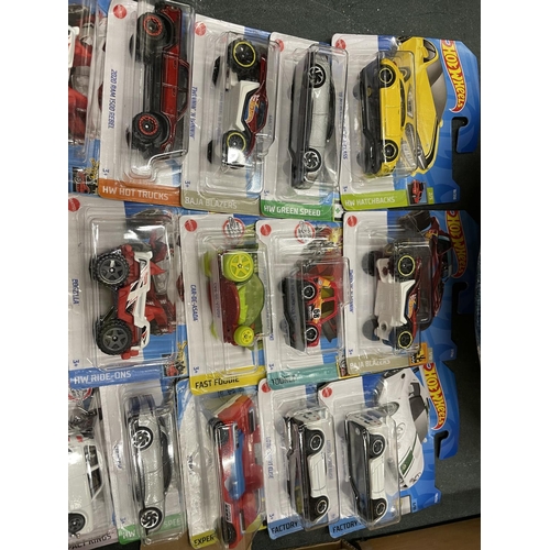 713A - TWENTY FIVE HOT WHEELS CARS IN BLISTER PACKS