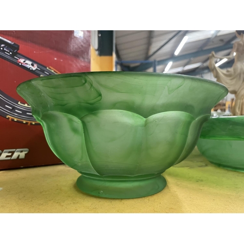 729 - THREE LARGE GREEN CLOUD GLASS BOWLS