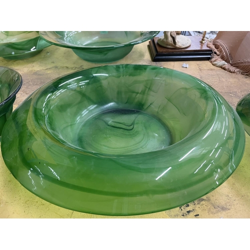 729 - THREE LARGE GREEN CLOUD GLASS BOWLS