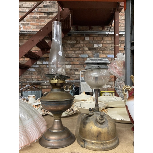 819 - TWO VINTAGE BRASS OIL LAMPS ONE OF UNUSUAL DESIGN