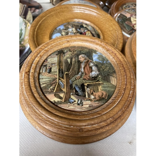 837 - NINE FRAMED PRATTWARE LIDS AND A WOODEN PLINTH