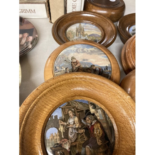 837 - NINE FRAMED PRATTWARE LIDS AND A WOODEN PLINTH