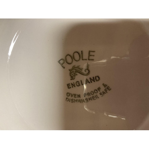 843 - A QUANTITY OF POOLE POTTERY DINNERWARE TO INCLUDE VARIOUS SIZED PLATES, SERVING DISH, SAUCE BOAT AND... 