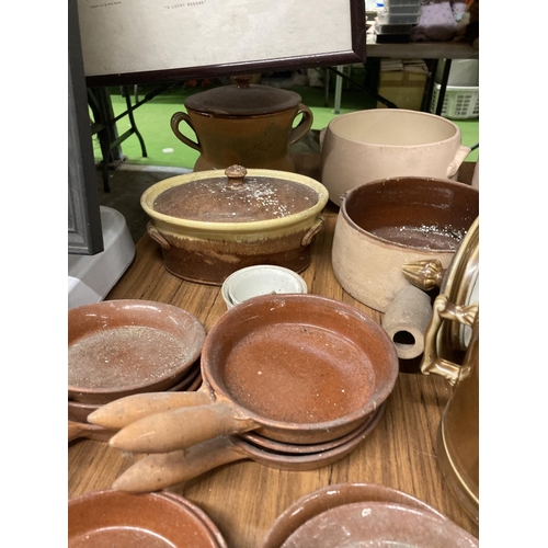 877 - A LARGE QUANTITY OF MAINLY FRENCH STONEWARE PANS, POTS, SERVING DISHES, ETC