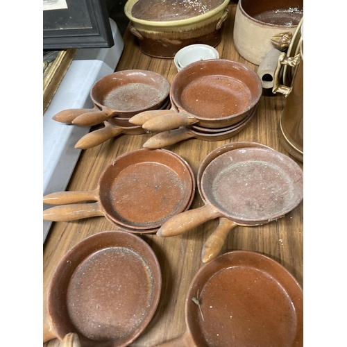 877 - A LARGE QUANTITY OF MAINLY FRENCH STONEWARE PANS, POTS, SERVING DISHES, ETC