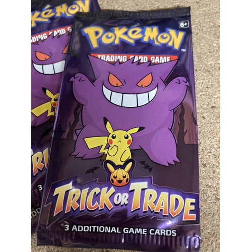 897 - THREE SEALED U. S. A. EXCLUSIVE TRICK OR TRADE POKEMON CARDS, BOOSTER PACKS