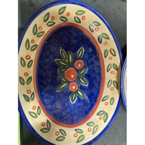 900 - TWO LARGE HANDPAINTED PORTUGUESE PLATTERS PLUS A HANDPAINTED CHARGER