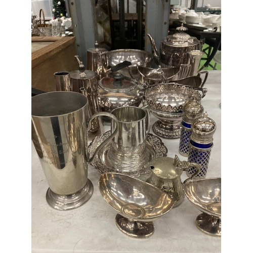 932 - A LARGE QUANTITY OF SILVER PLATED ITEMS TO INCLUDE TEA AND COFFEE POTS, CRUETS, BOWLS, POSY VASE, TA... 