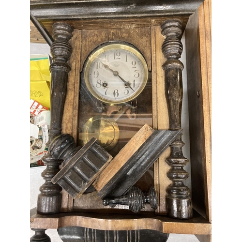 934 - TWO VINTAGE WALL CLOCKS IN WOODEN AND GLASS FRONTED CASES - ONE IN NEED OF RESTORATION