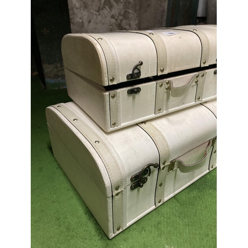 968 - TWO VINTAGE STYLE CREAM TRUNKS WITH STUDDED BANDING - WIDTH 45 X 35