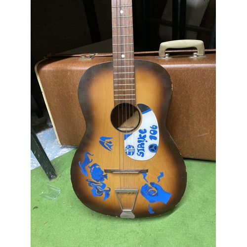 969 - A VINTAGE ACOUSTIC GUITAR AND CASE