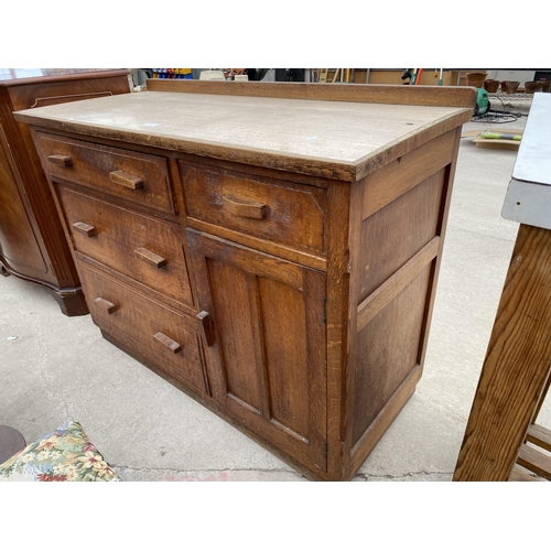 2703 - A MID 20TH CENTURY OAK KITCHEN SIDEBOARD WITH INSET FORMICA TOP, 42