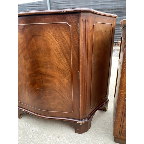 2704 - A MAHOGANY SERPENTINE FRONTED SIDE CABINET, 40