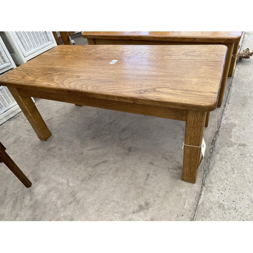 2709 - A MODERN OAK COFFEE TABLE ON SQUARE LEGS, 36X17.5